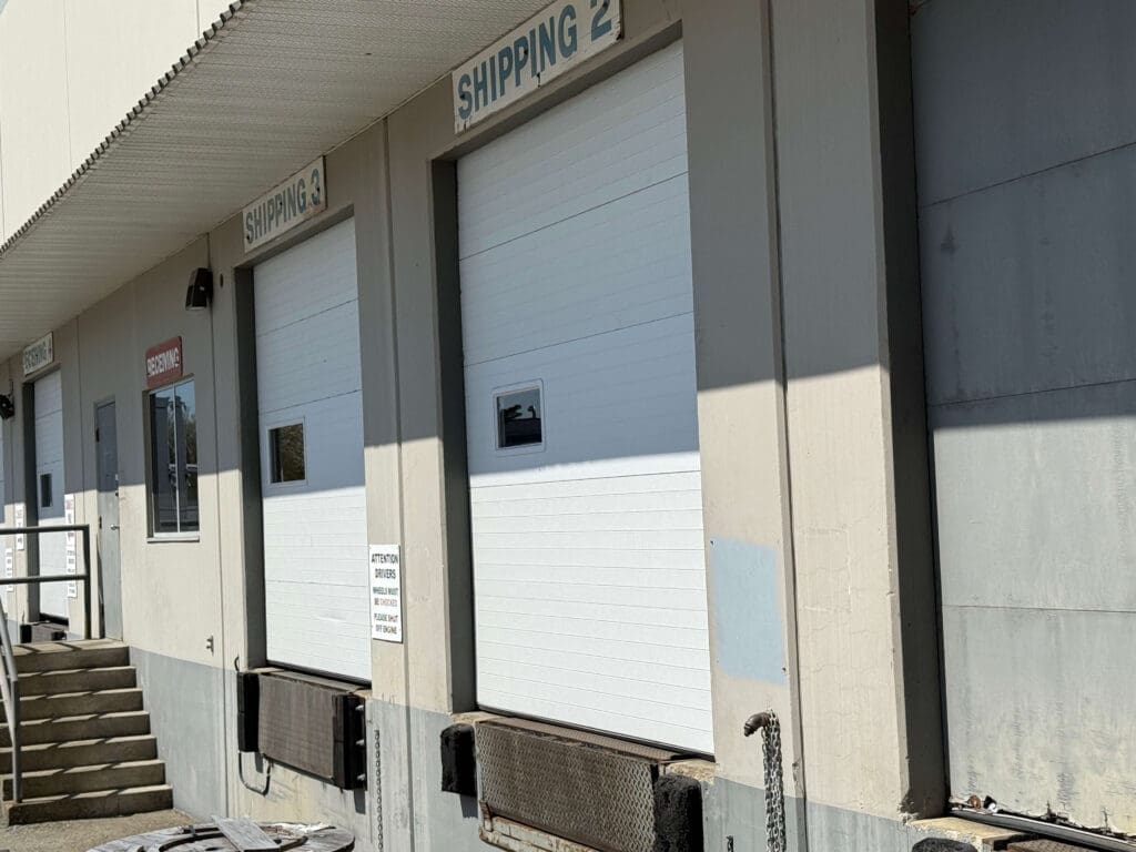 Two closed shipping doors with windows